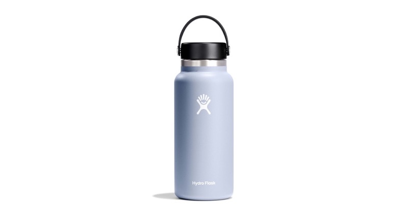 A Hydro Flask 32 oz Wide Mouth insulated stainless steel water bottle in a pale blue finish