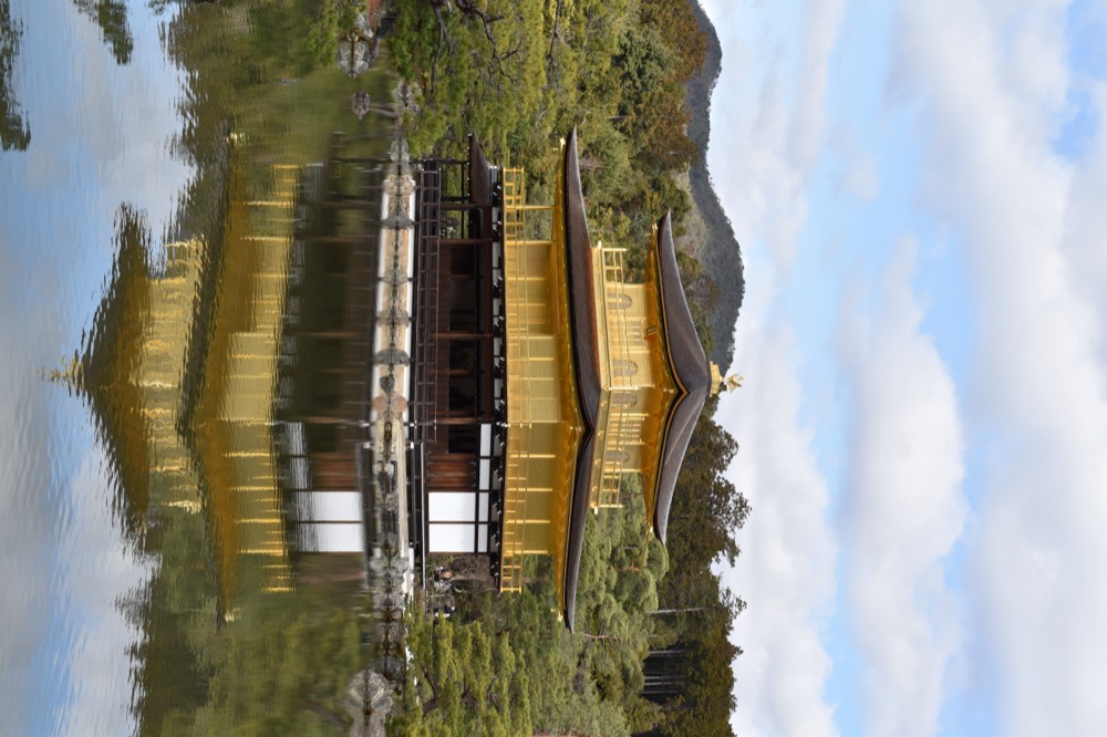 The Golden Pavilion Kinkaku-ji reflected in its mirror pond in Kyoto