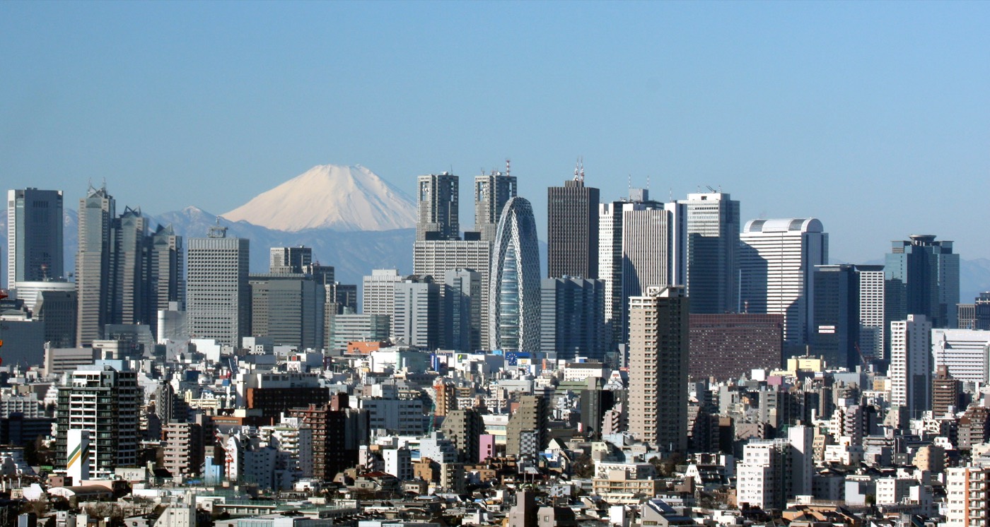 The skyscrapers of Shinjuku, Tokyo, with Mount Fuji visible in the distance