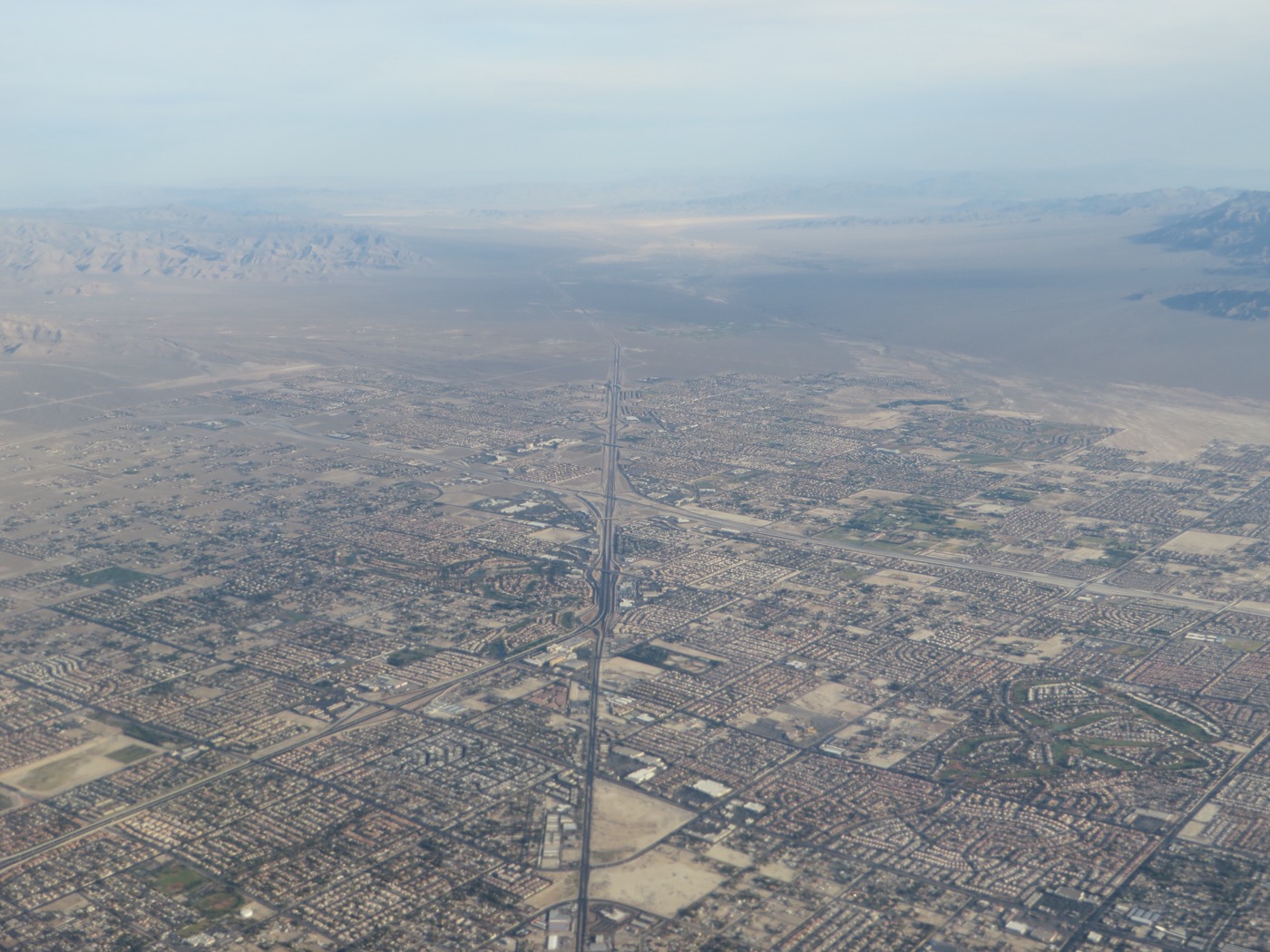 Aerial view of the Centennial Hills suburb in northwest Las Vegas with mountains on the horizon