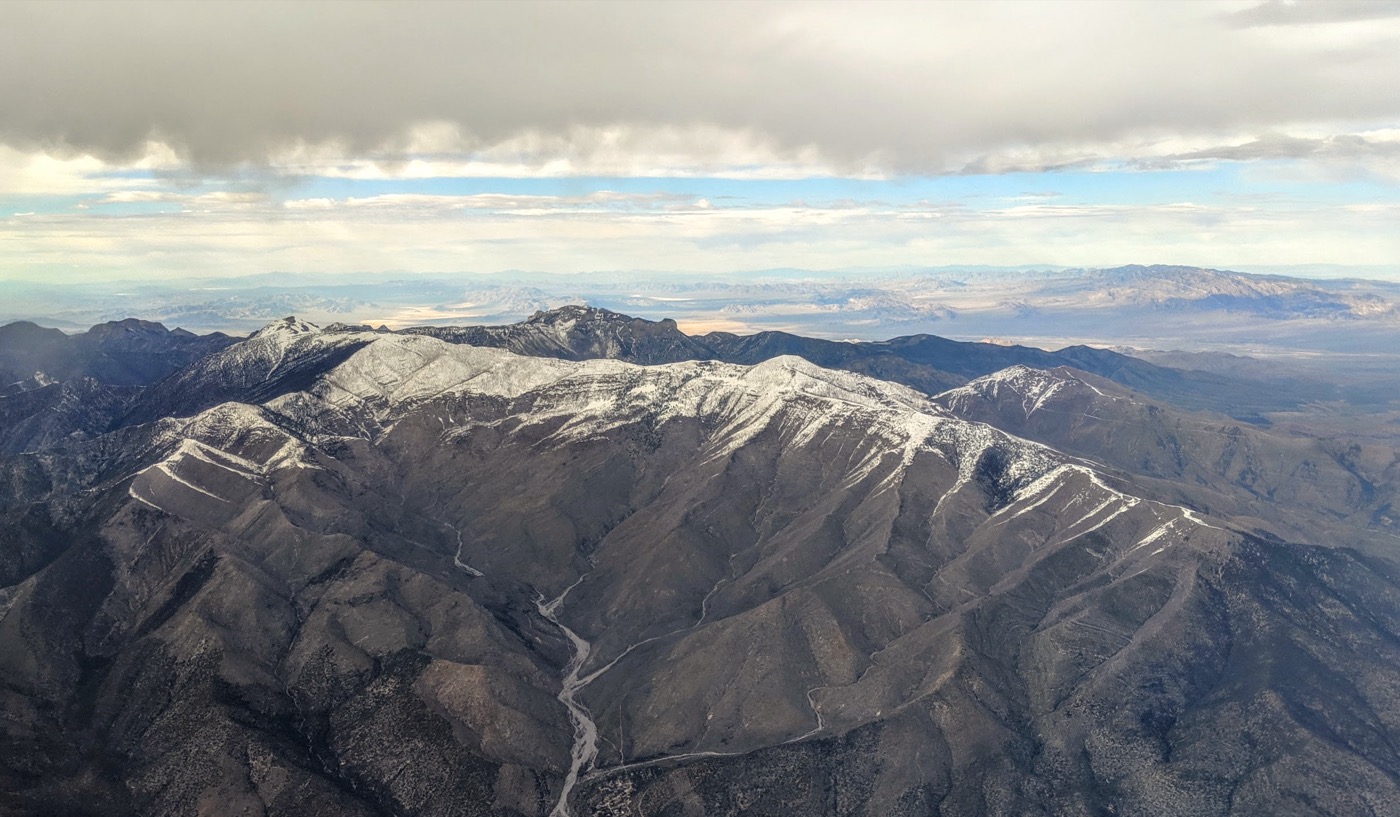 Snow-dusted peaks of Mount Charleston and the Spring Mountains rising above the desert near Las Vegas